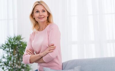 Portrait of pretty mature woman looking away