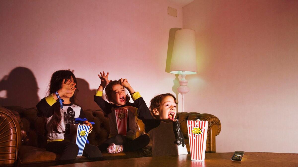 Kids watching thriller and screaming