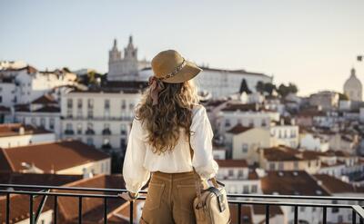 A landscape shot of a young female traveler