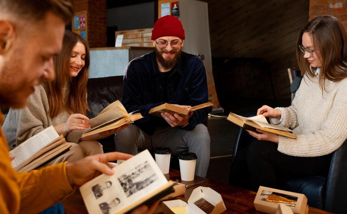 Side view people holding books