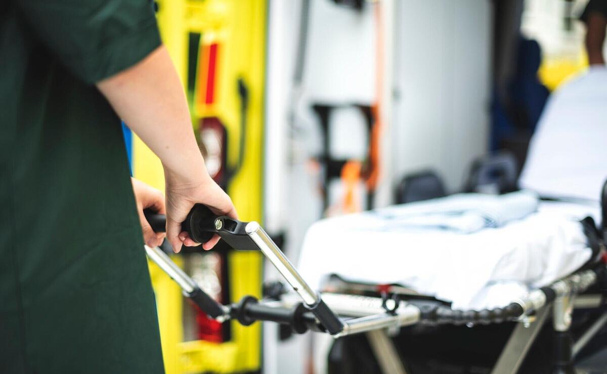 Paramedics at work with an ambulance