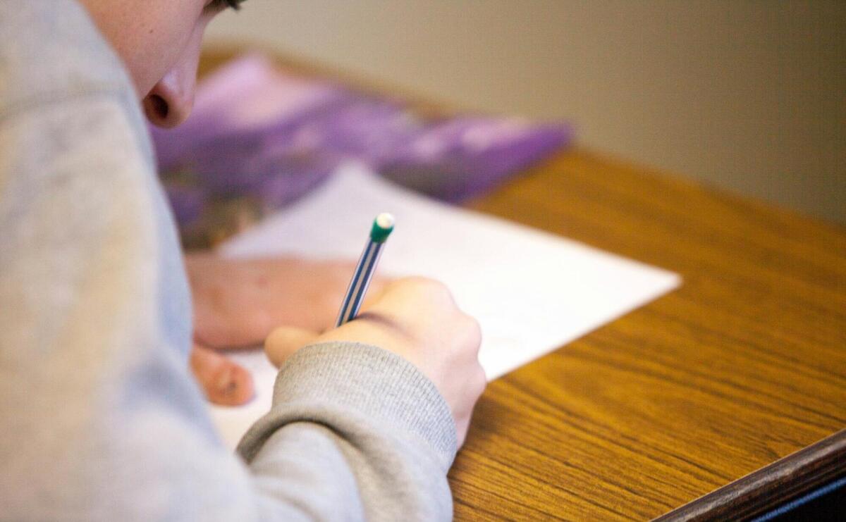 person using pencil