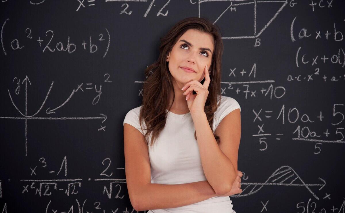 Female student thinking about mathematics problem