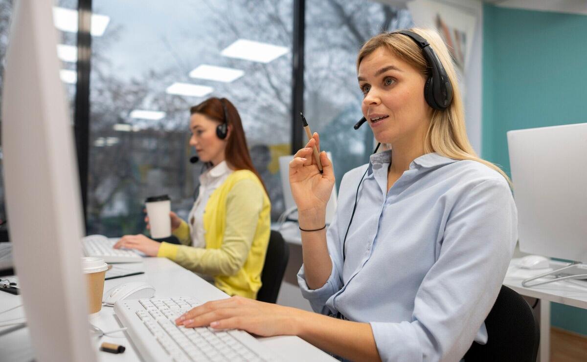 Colleagues working together in a call center office