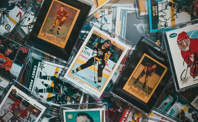 A close-up view of assorted vintage and modern hockey trading cards.