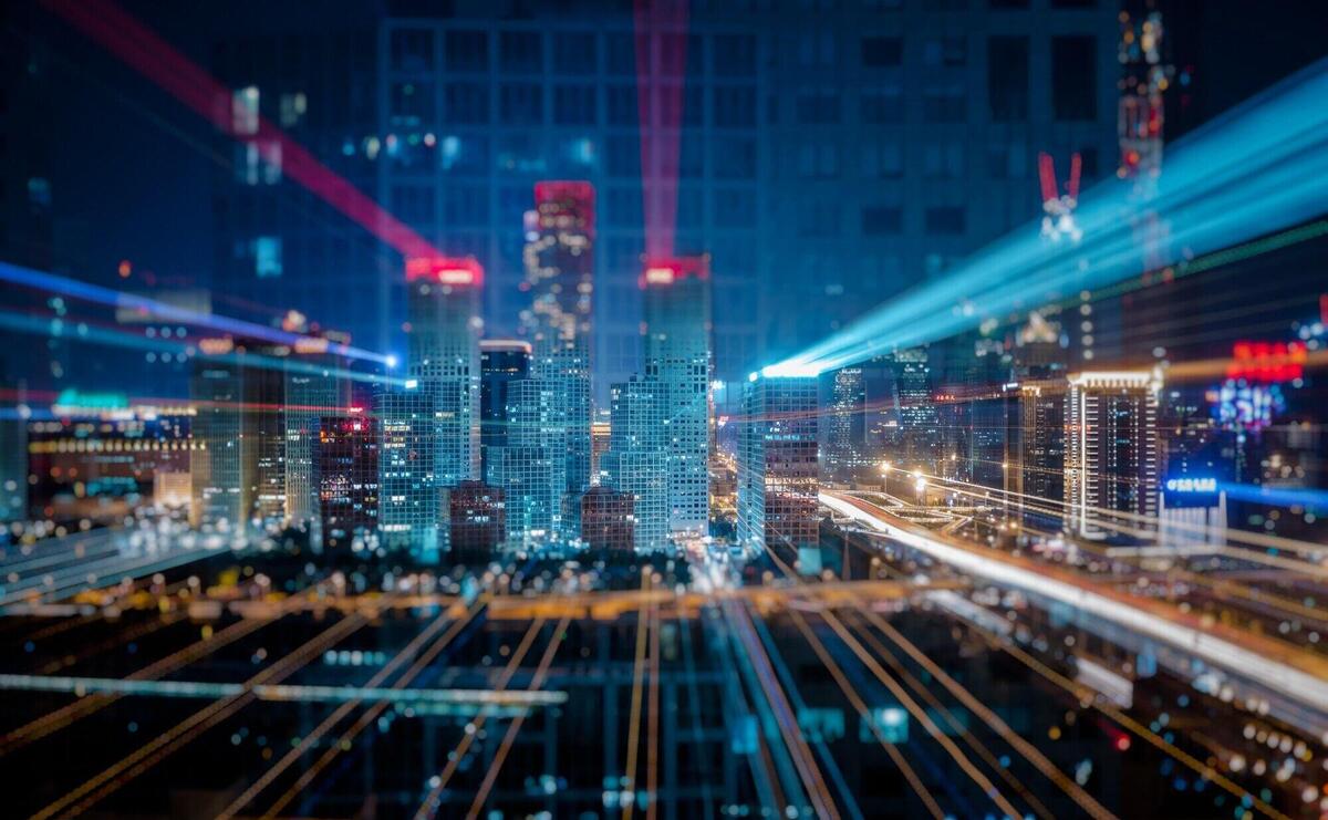 Light trails above buildings