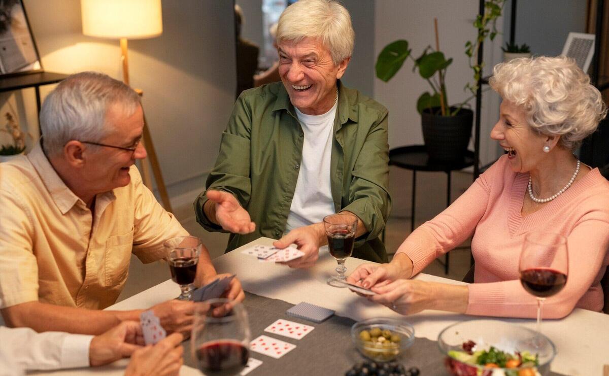 Senior friends having a party at night