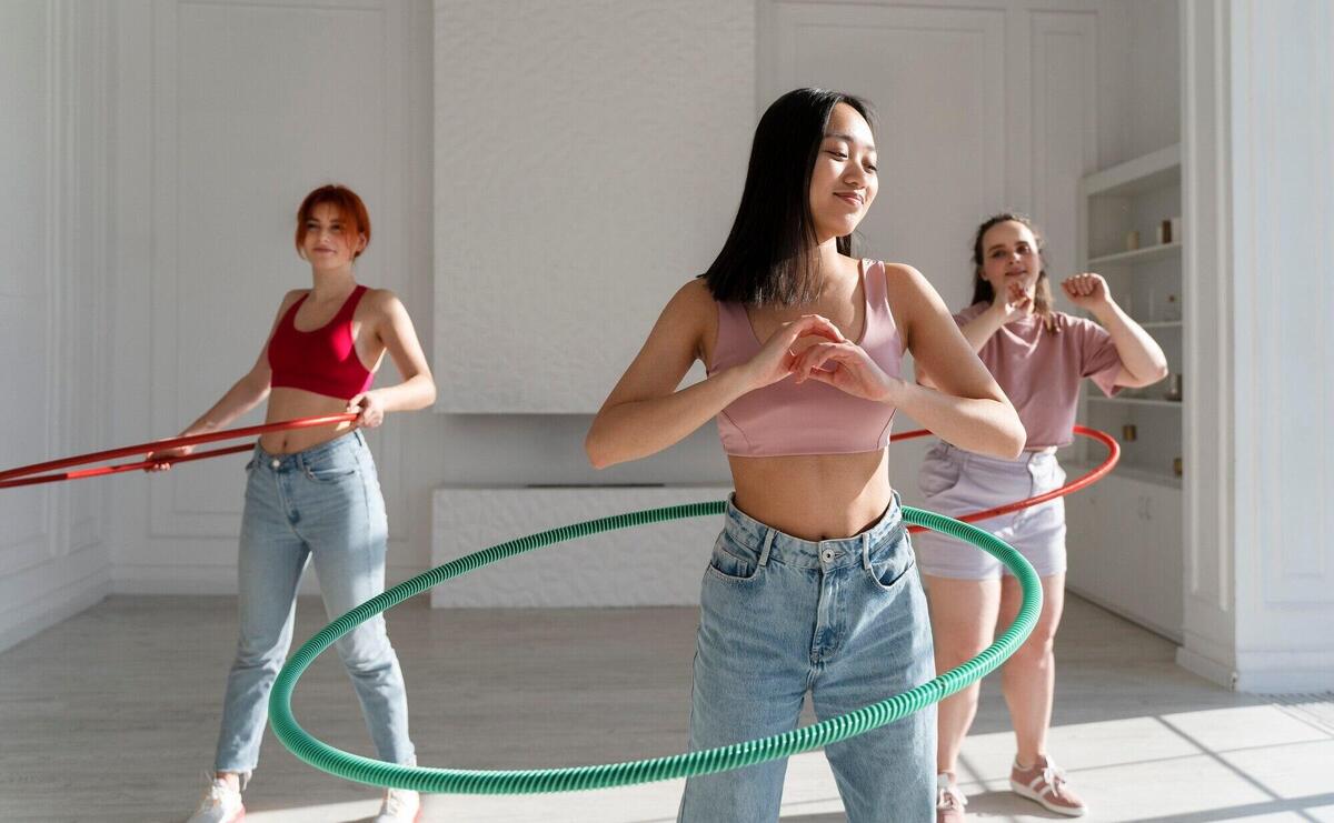 Young women with hula hoops