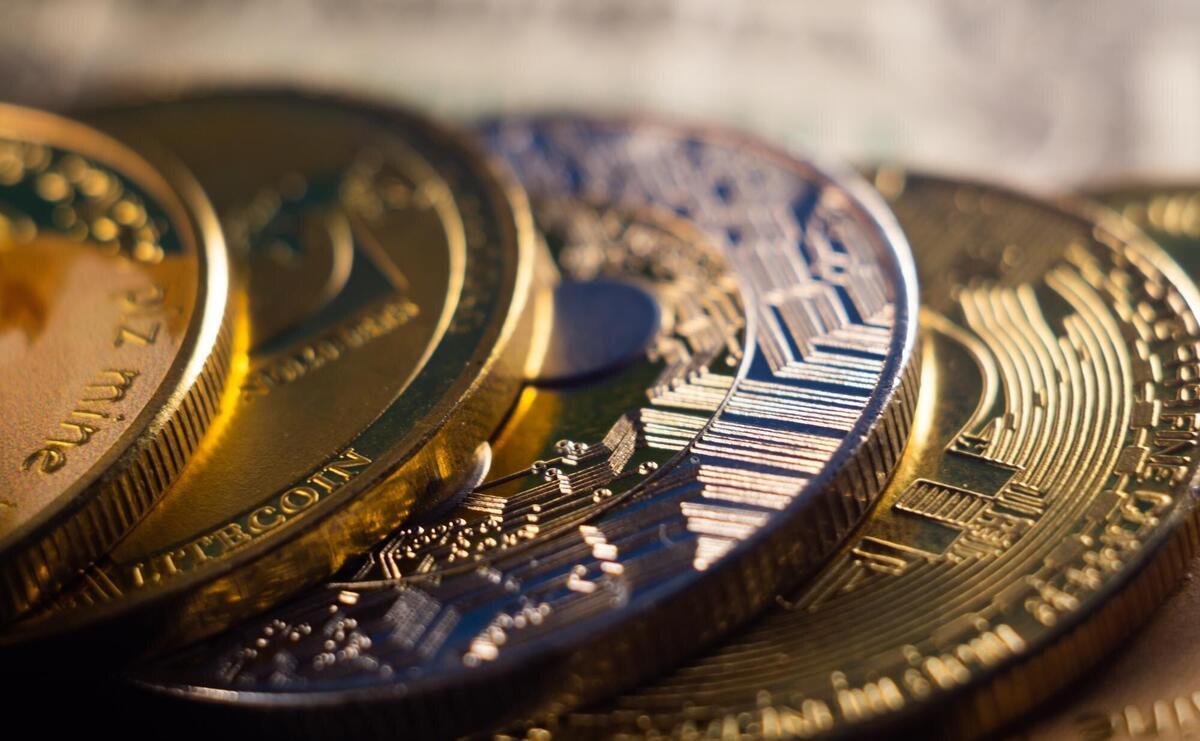 Closeup shot of a pile of cryptocurrency cash golden coins