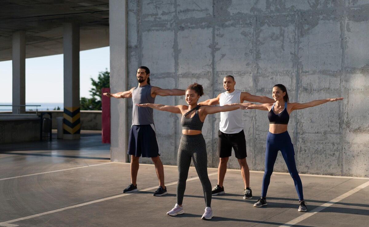 Group of people exercising together outdoors