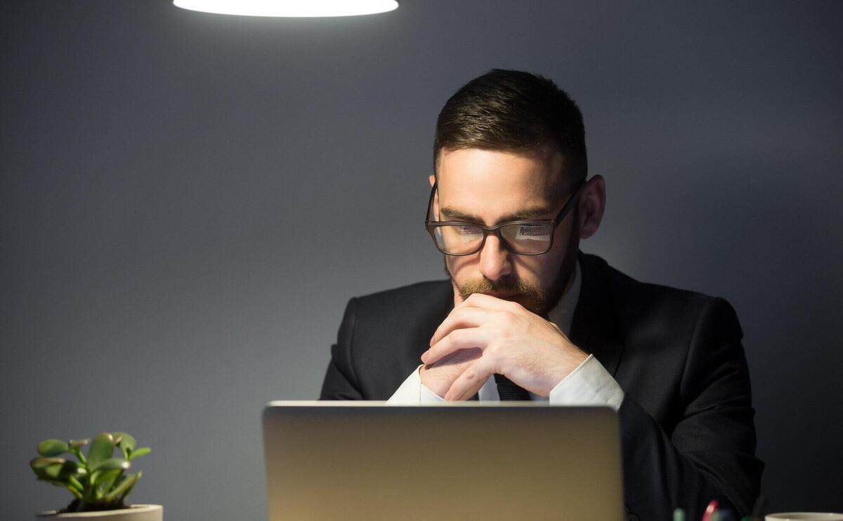 Concerned male thinking about company problem solution