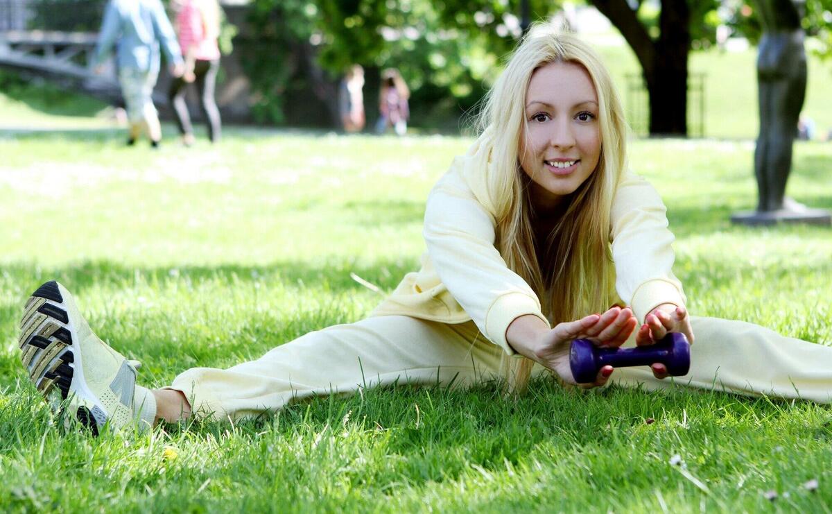 Woman doing fitness workout in the park