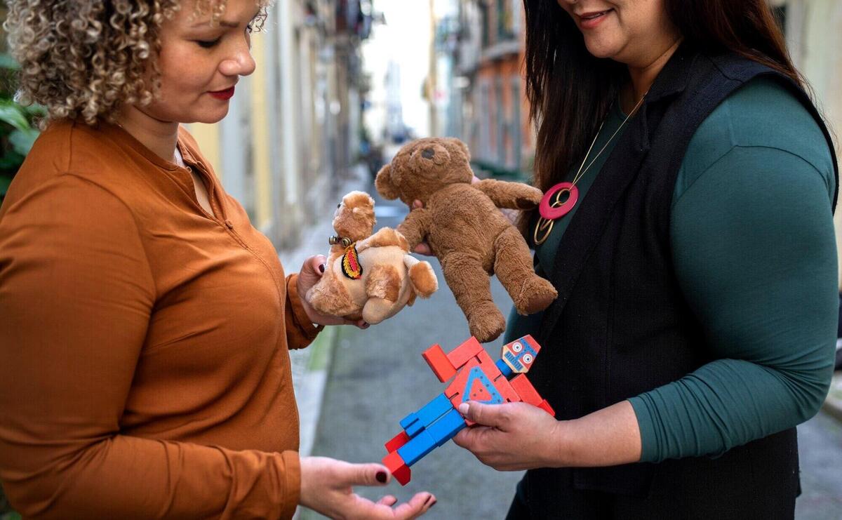 Side view women exchanging items