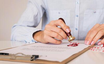 Person using a wax seal front view