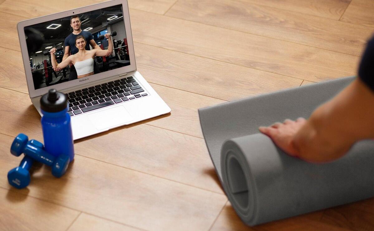 Close up hand holding yoga mat