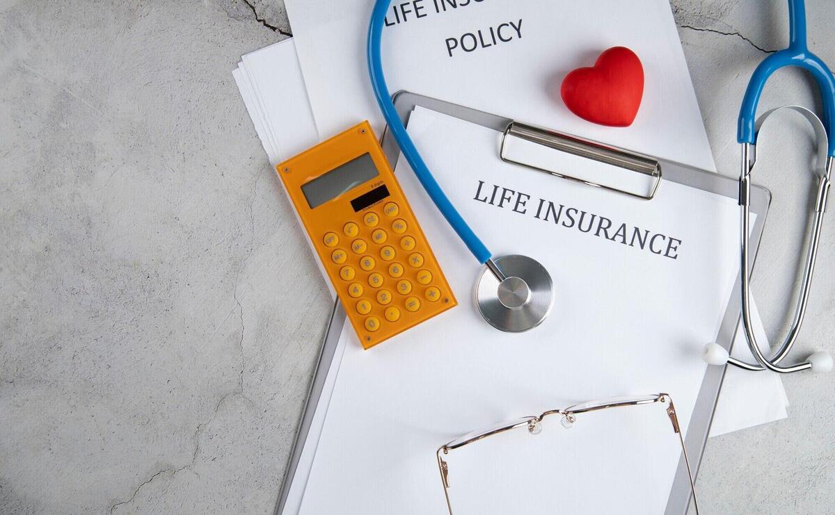 Life insurance concept with calculator