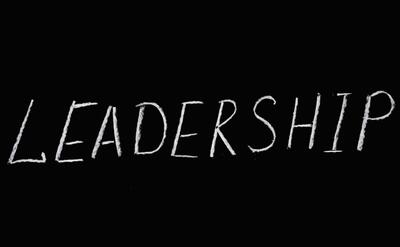 Leadership lettering text on black background