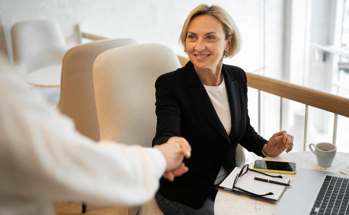 Blonde business woman working