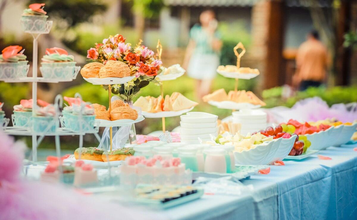 Various Desserts on a Table covered with Baby Blue Cover