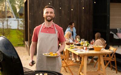 Medium shot man holding food plate