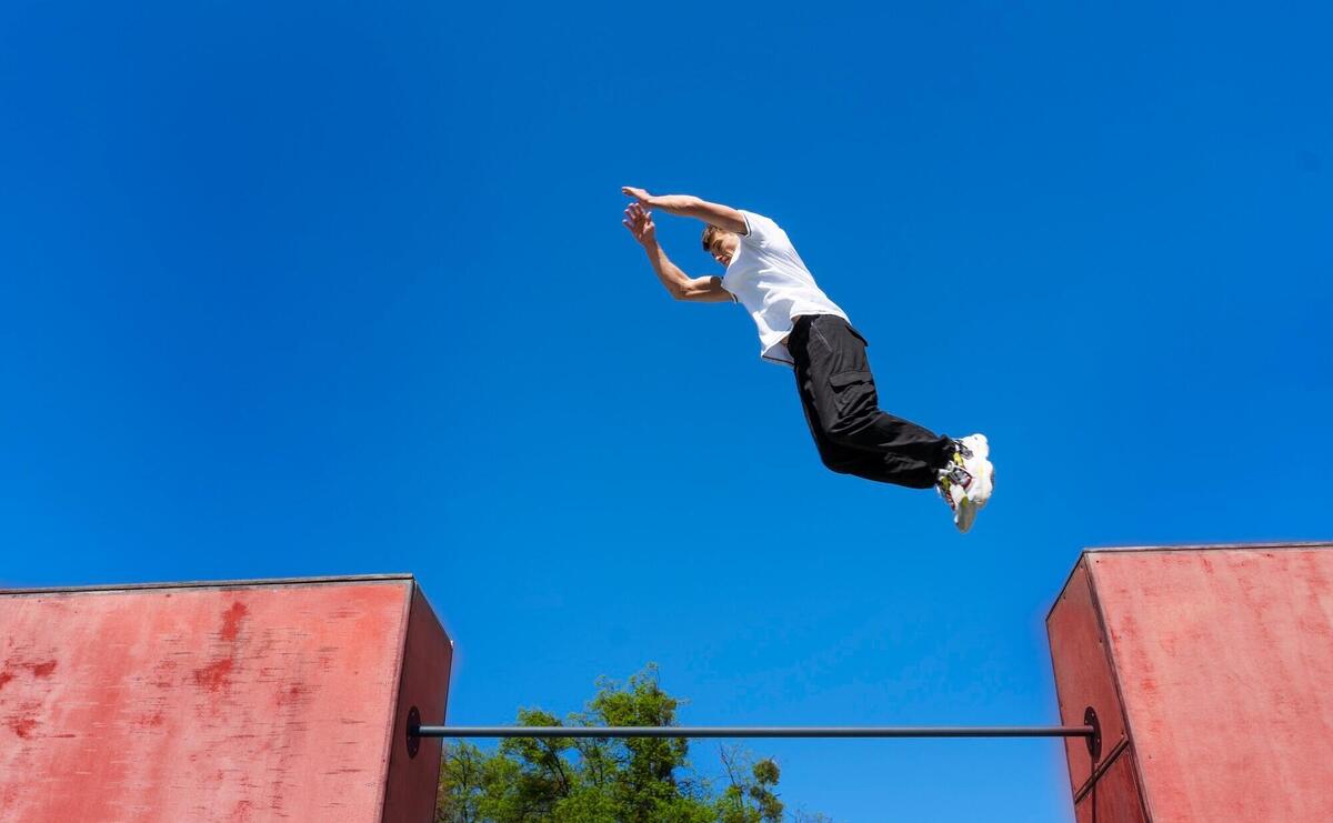 Full shot man doing parkour