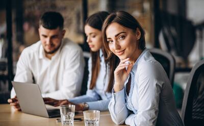 Group of people working out business plan in an office