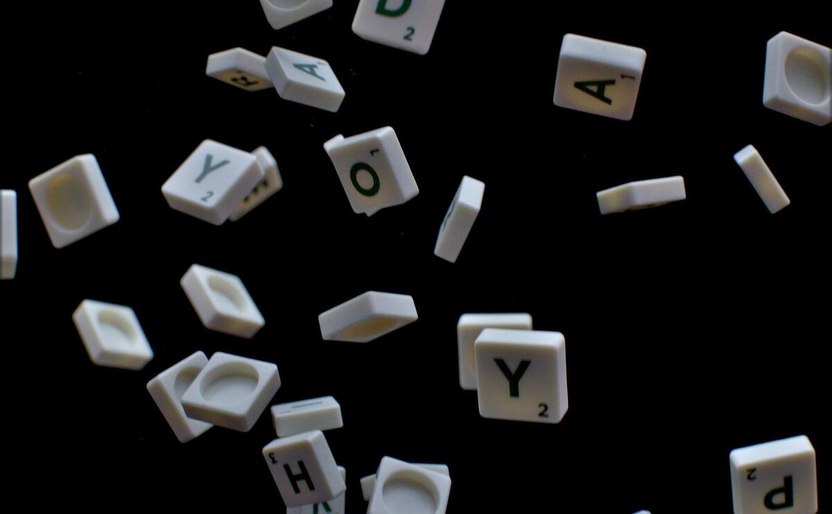 white and black letter t-letter blocks