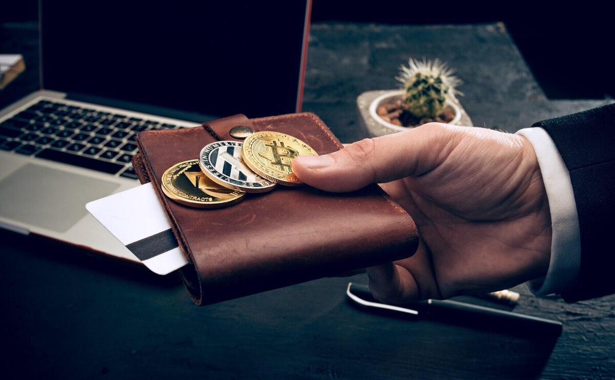 The golden bitcoin in mail hands