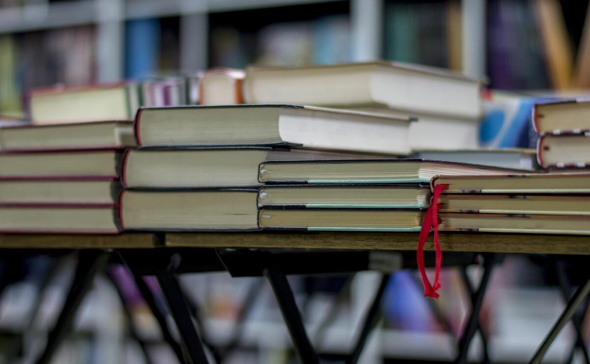 Closeup of Books wellorganized on shelves in the bookstore