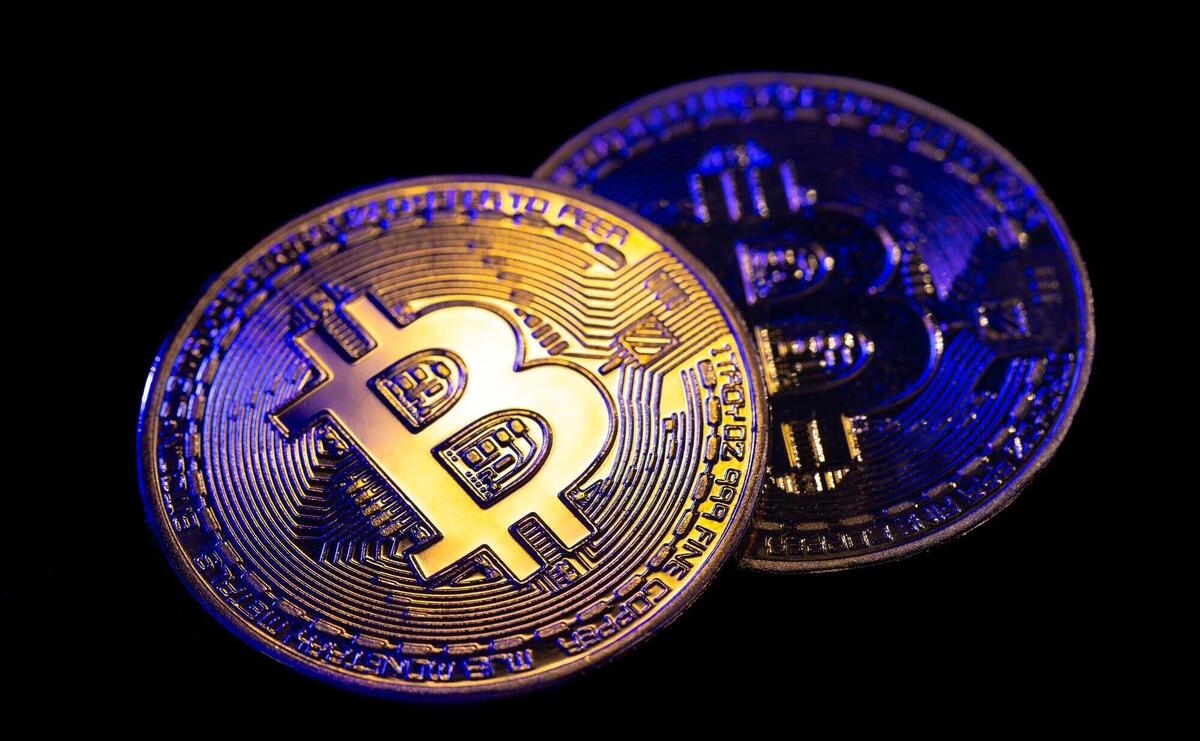 Bitcoin coin closeup on a black background Background with cryptocurrency